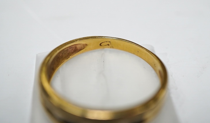 A yellow metal and channel set sapphire and diamond set half hoop ring, size Q/R, gross weight 4.2 grams. Condition - fair